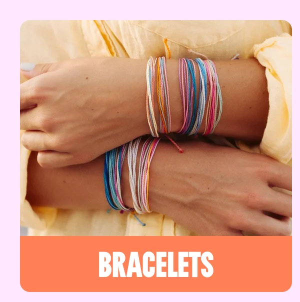 an image of a woman wearing a pair of bracelets with a pink background