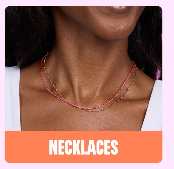 an image of a woman wearing a necklace with a pink bead