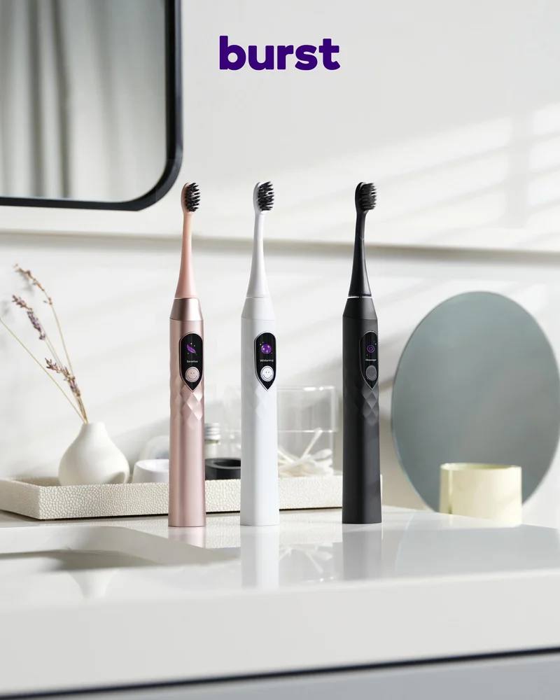 BURST Pro Sonic Toothbrush featured on a. bathroom countertop.