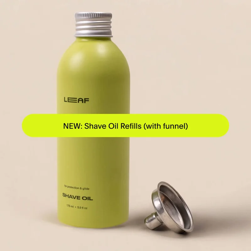 Bottle of shave oil refill with funnel