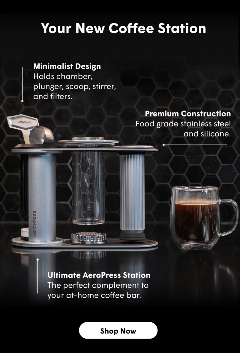 Your New Coffee Station Minimalist Design Holds chamber, plunger, scoop, stirrer, and filters. Premium Construction Food grade stainless steel and silicone. Ultimate AeroPress Station The perfect complement to your at-home coffee bar. [SHOP NOW]