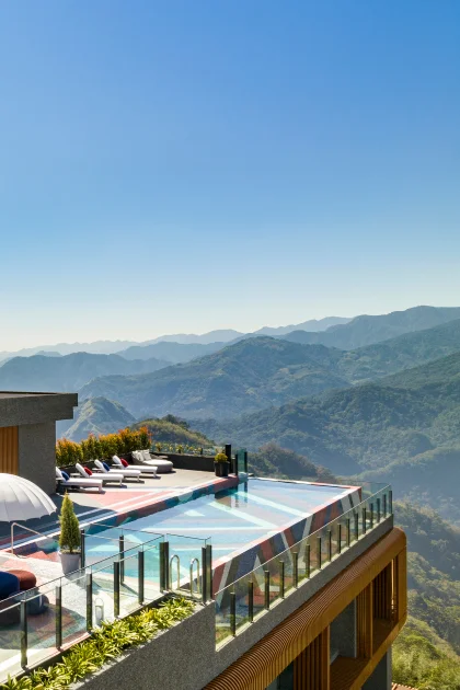 A view of the mountains from the rooftop pool deck at Hotel Indigo Alishan in Taiwan.
