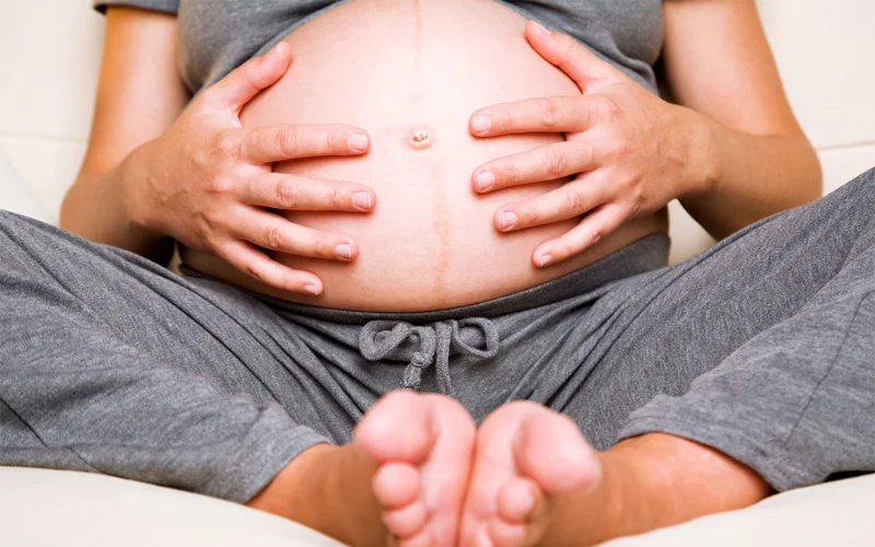 Pregnancy can be hard on your feet—and it's not just swelling and changes to your gait. Some women experience a phenomenon called 'mom feet' in which their feet grow a half size or more.