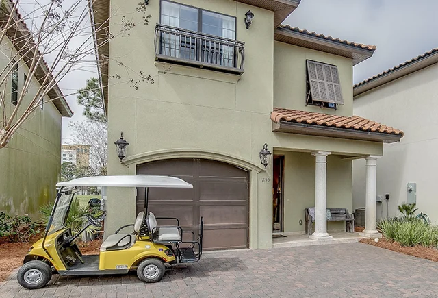 Perfect your swing at a private home rental with panoramic fairway views.