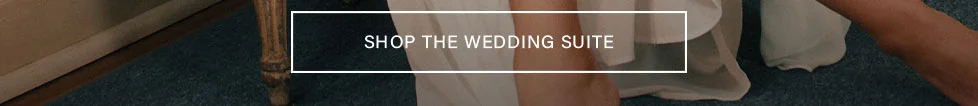 Shop The Wedding Suite button. Find wedding dresses, invitations, and bridal accessories.