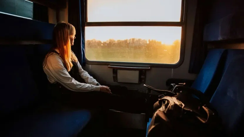image of woman on a train