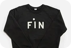 Gif of Clare V. x Sundance merch: a sweatshirt and a baseball hat on various models and from different angles.