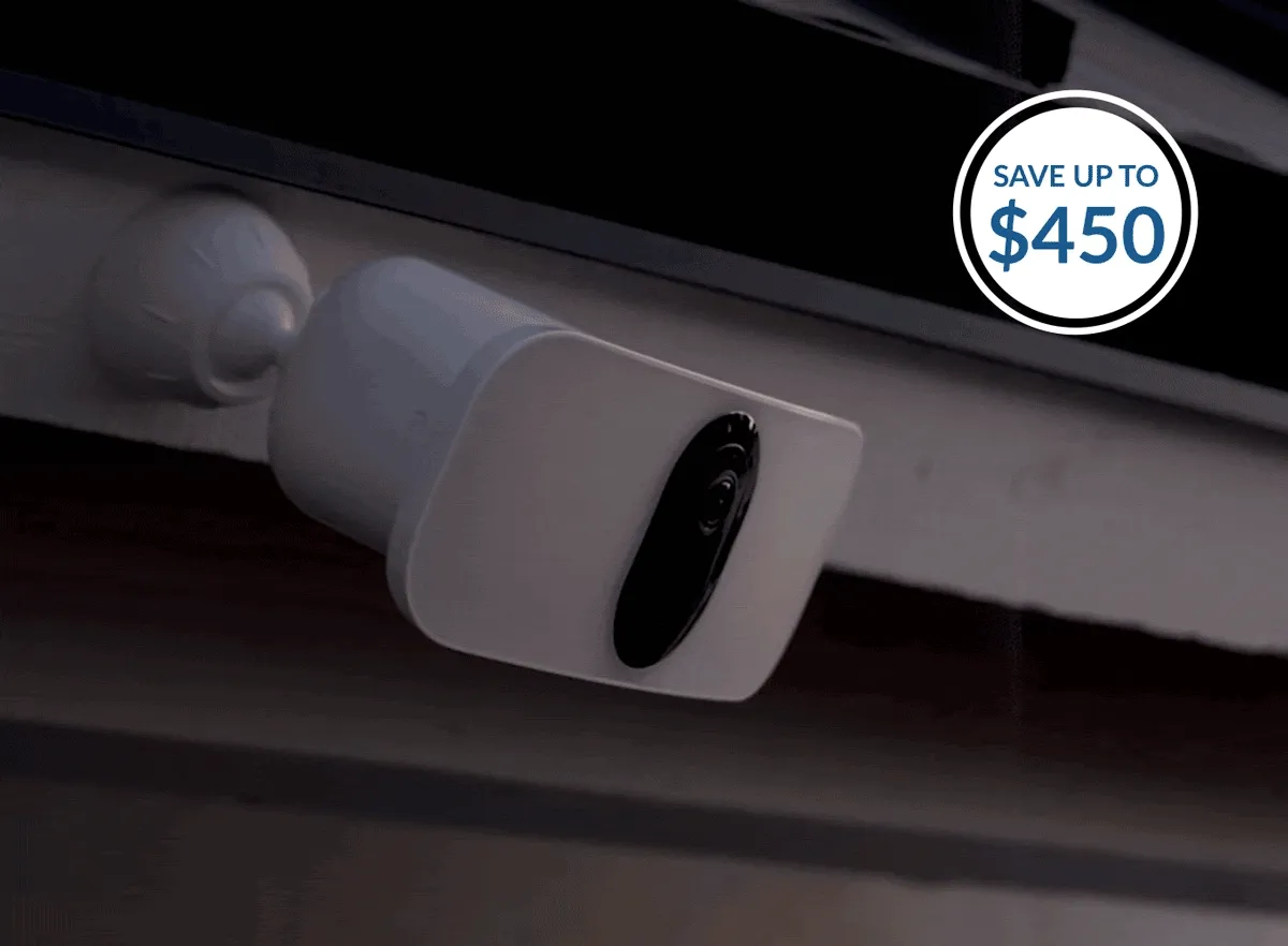 Save up to $450. Arlo Pro 3 Wireless Floodlight Camera turning on at night.