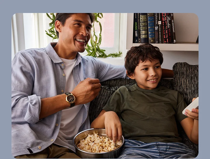 Father and son spend quality time over movies.