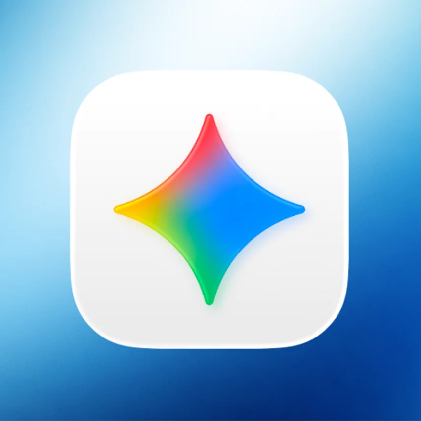 A white rounded square icon featuring a four-pointed star with a gradient of red, yellow, green, and blue, centered against a background of light-to-dark blue.