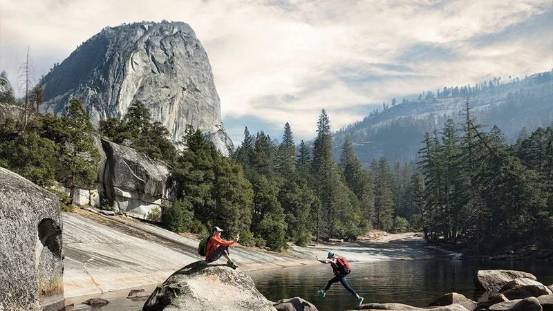 Image description: Hikers explore Yosemite's Emerald Pool.