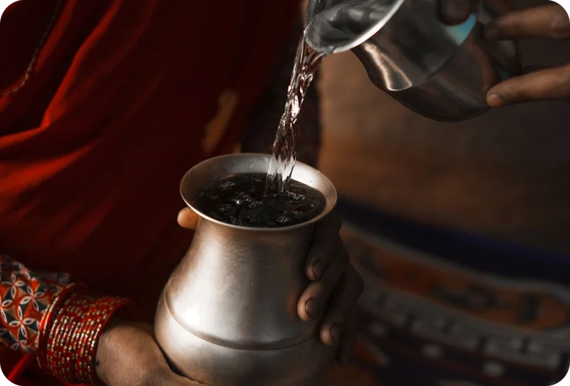 Clean water being poured into a glass.
