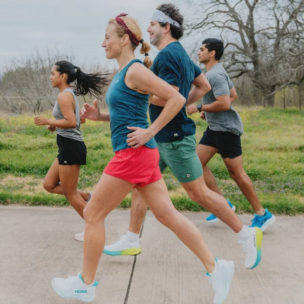 Group of people running together