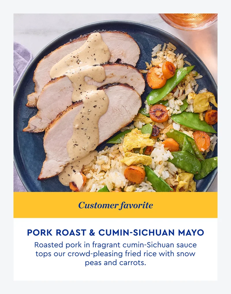 CUSTOMER FAVORITE | Pork Roast and Cumin-Sichuan Mayo - Roasted pork in frgrant cumin-Sichuan sauce tops our crowd-pleasing fried rice with snow peas and carrots. | ORDER NOW