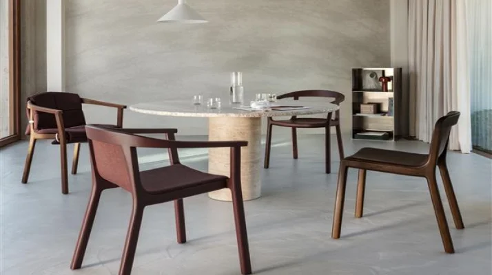 A group of Lijn Armchairs around an off-white table, designed by Carole Baijings for Geiger.