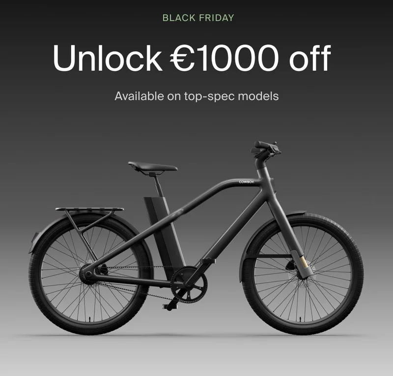 A graphic. Black Friday Cowboy promotion with a rendered e-bike offering €1000 off. Available on top-spec models.