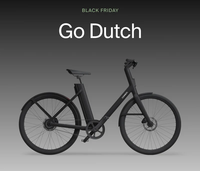 A graphic. Black Friday promotional imge featuring a black Cowboy e-bike against a dark gradient background, with the text “Go Dutch” in large letters above the bike.