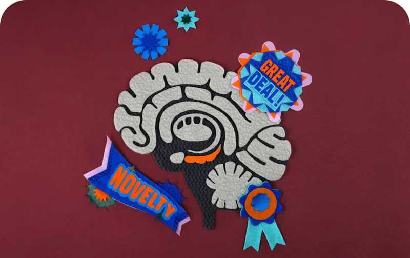 An illustration of a human brain with stars, banners and ribbons made with fabric scraps.
