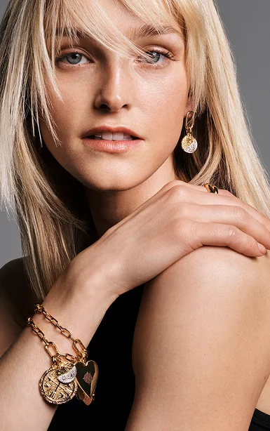 Model styled in celestial Pandora Talisman on bracelet and earring