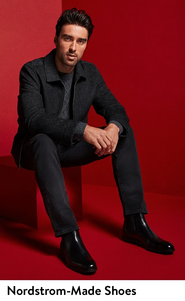 A man wearing Nordstrom-made Chelsea boots.