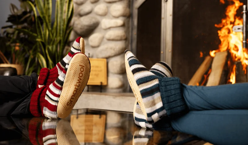 Slippers next to a warm fire