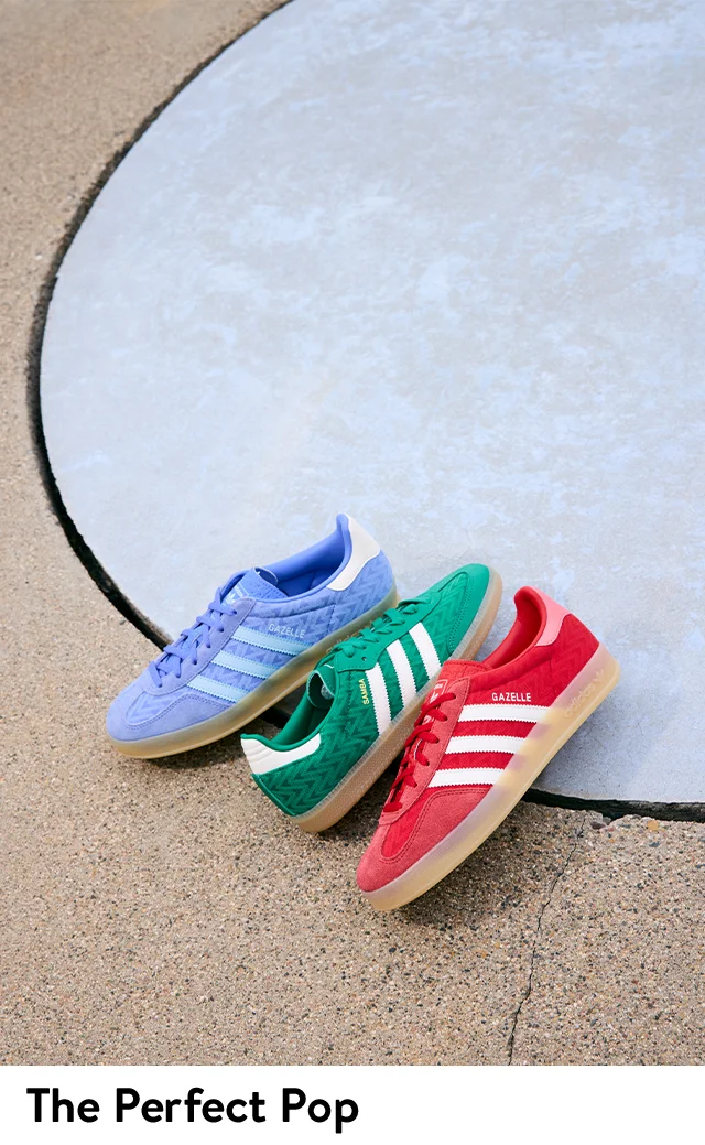 Adidas sneakers in purple, green and red.