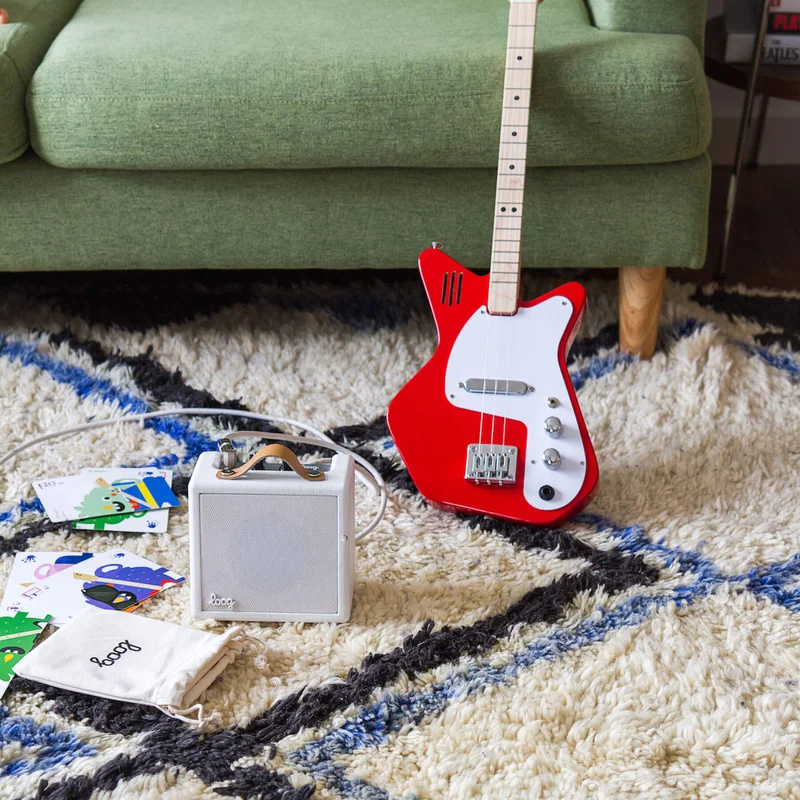 Loog mini amp with a loog guitar