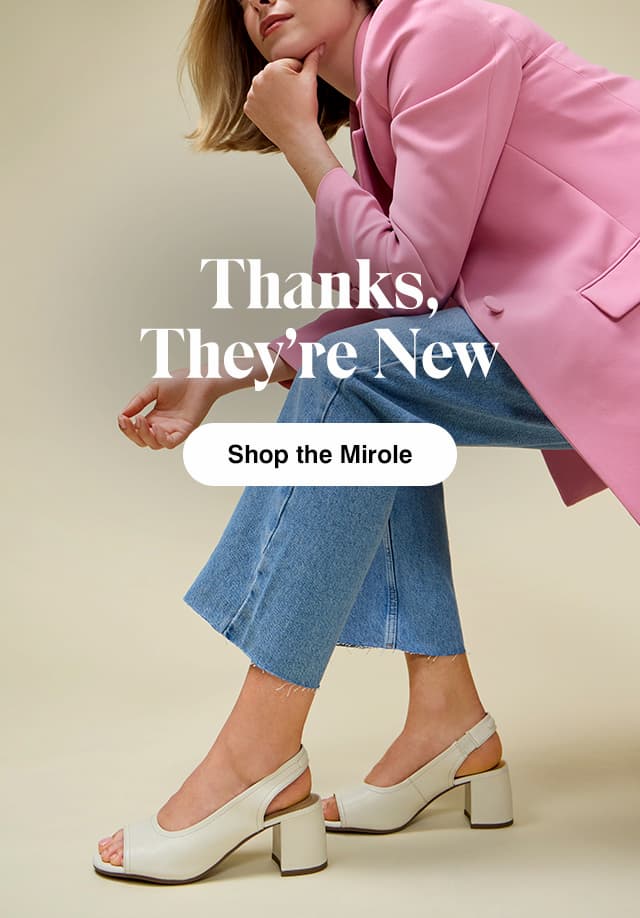 A woman in a seated position wearing a pink blazer, cropped jeans, and the Mirole Sandal in Chalk White. The email says Thanks, They’re New.