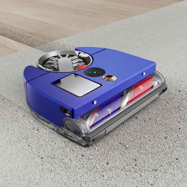 Close Up Of Dyson 360 Vis Nav Robot Vacuum In Blue/Nickel