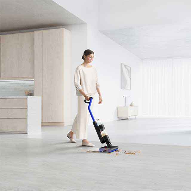 Close Up Of Dyson WasG1 Wet Cleaner In Matte Black/Ultra Blue