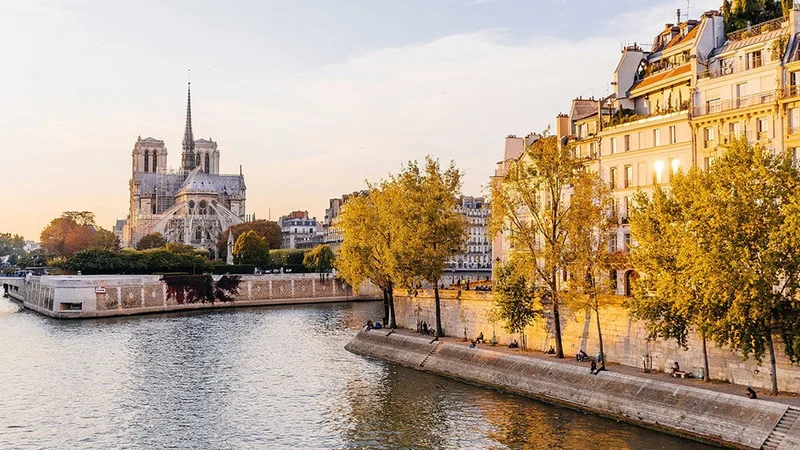 Image description: View of Notre Dame Cathedral from the Seine River, Paris.