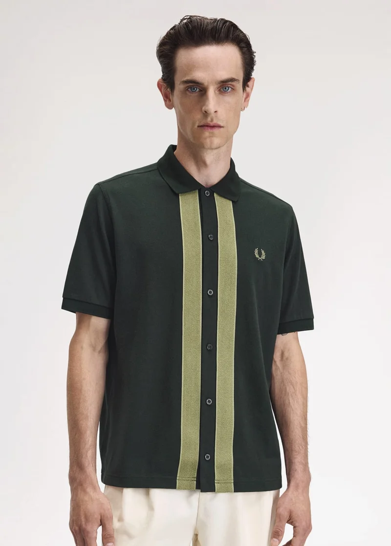 Dark green Chenille tape button through polo shirt with pale green panelling