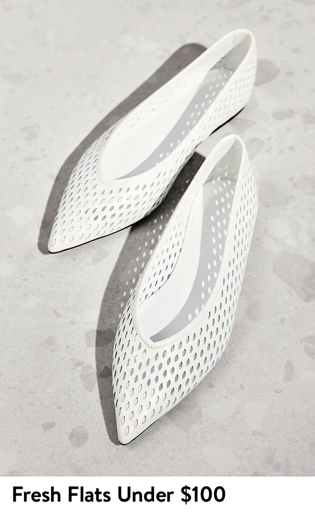 White flats with pointed toes.