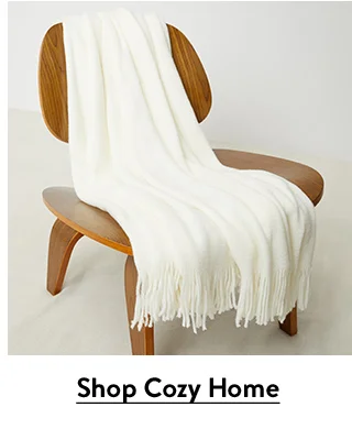 A white throw draped over a chair.