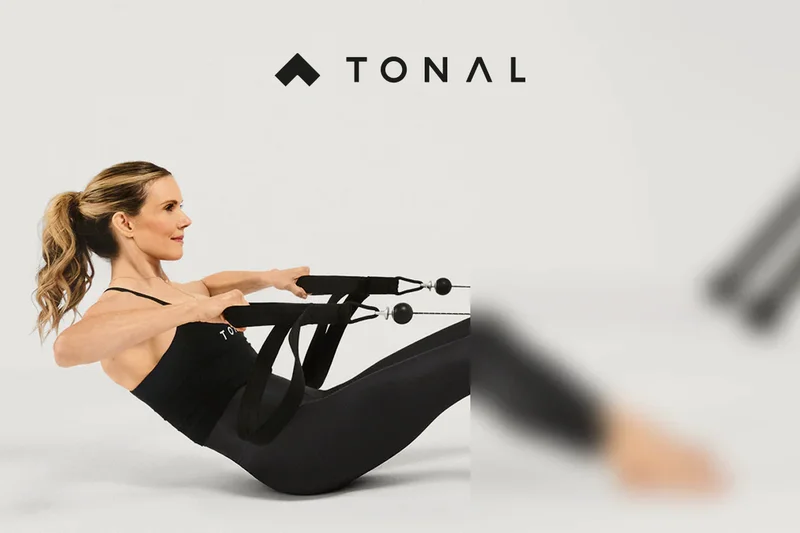 A woman working out with Tonal