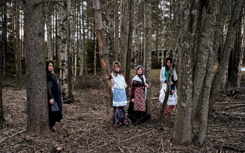 Children dressed up as witches photographed in Älvdalen, Sweden on Maundy Thursday.