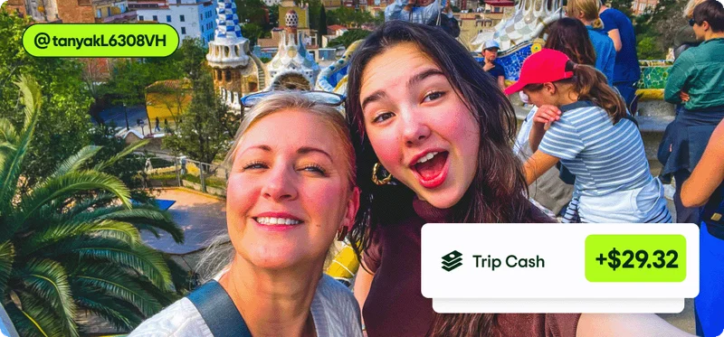 Image Description: Two people smiling with a crowd of people in the background. A Trip Cash icon with $29.32 is on the bottom right corner of the image.