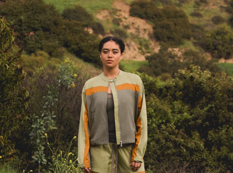A stunning vista: this new jacket and short duo that’s water-resistant, UPF 50+, and made with SuperTrack, a 100% recycled material.