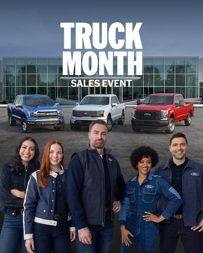 Five Ford Crew members standing in front of three Ford trucks. The words "Ford Truck Month Sales Event" are above.