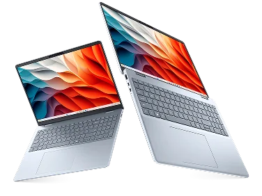 Two Dell 16 Plus Laptop computers in midair.