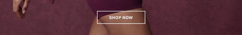Plum seamless high-waisted underwear on a person, with a matching background. 'SHOP NOW' button promotes our comfortable new intimates collection.