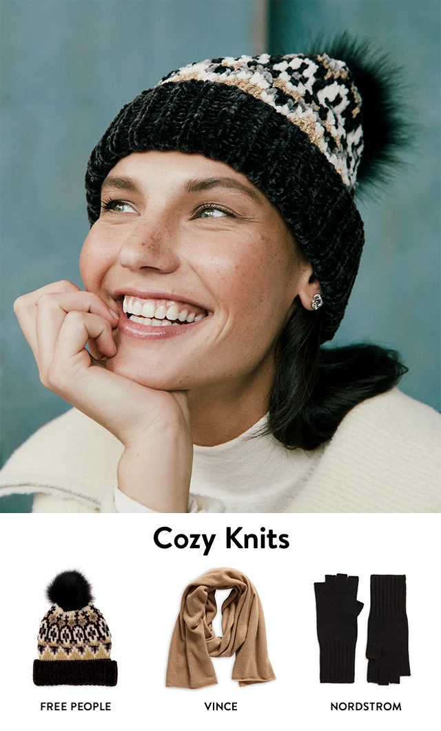 Woman wearing a knit beanie. Free People beanie, Vince scarf, Nordstrom gloves.
