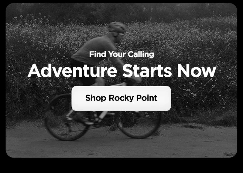 Find your calling. Adventure starts now. Shop Rocky Point Band. Background image of a biker.