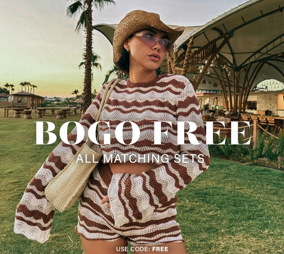 Woman in brown and white wavy knit matching set, straw hat, promoting BOGO FREE matching sets for a chic summer look.