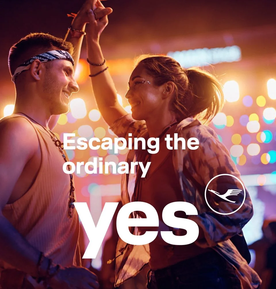 A young couple dancing in a club.