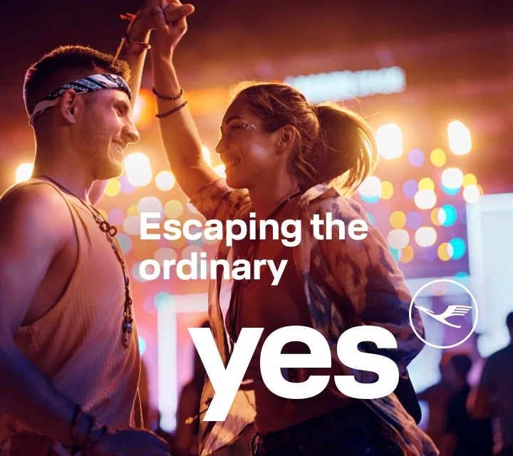 A young couple dancing in a club.