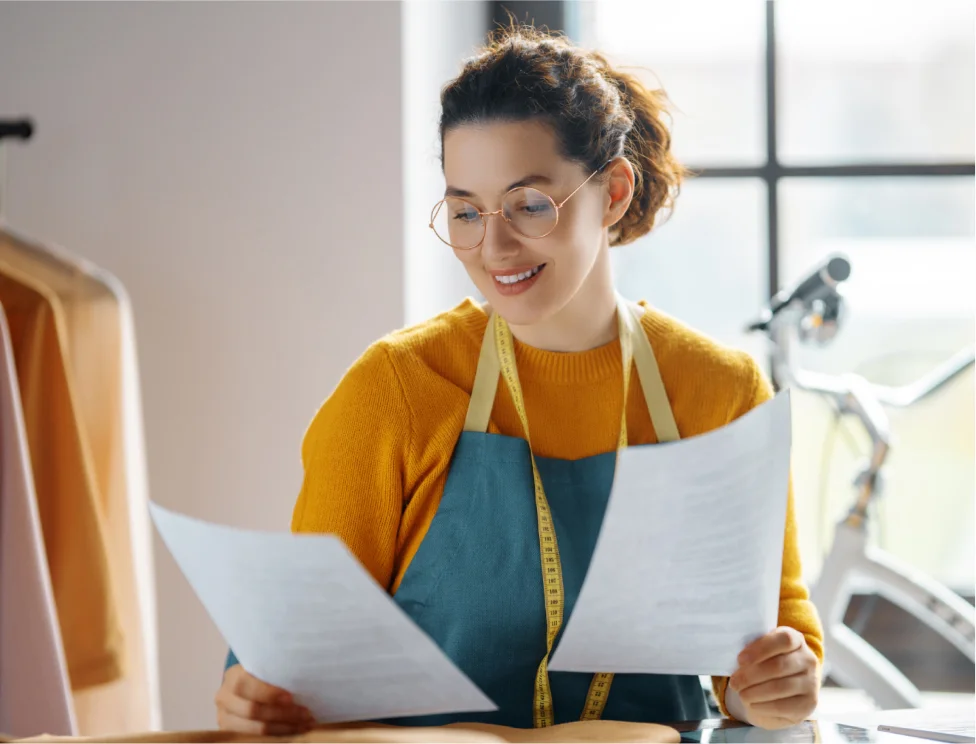 Business owner with forms