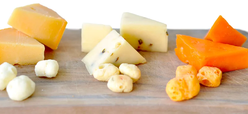 Moon Cheese | Blocks of cheese on butcher block