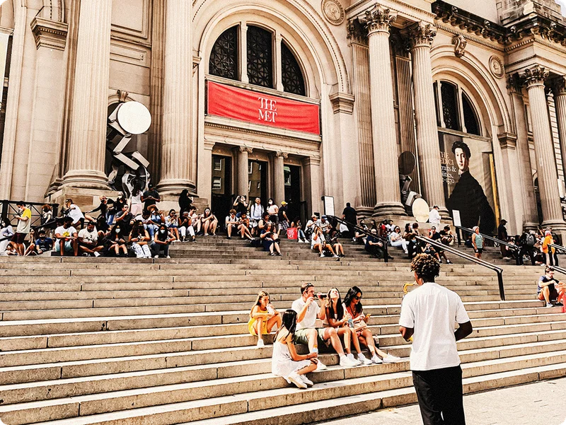 Image Description: The famous steps up to New York City’s Metropolitan Museum