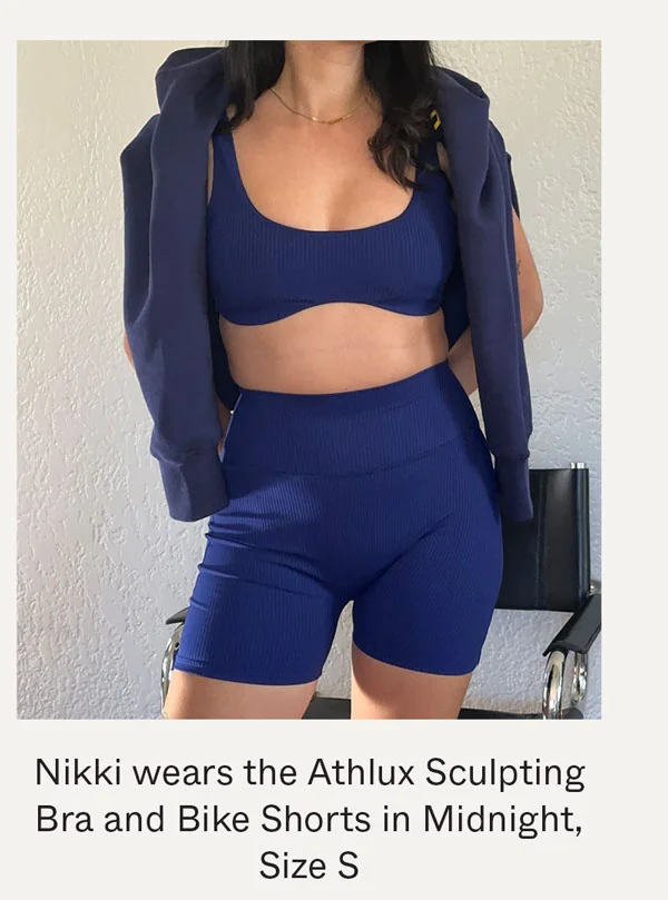 Nikki wears the Athlux Sculpting Bra and Bike Shorts in Midnight, Size S